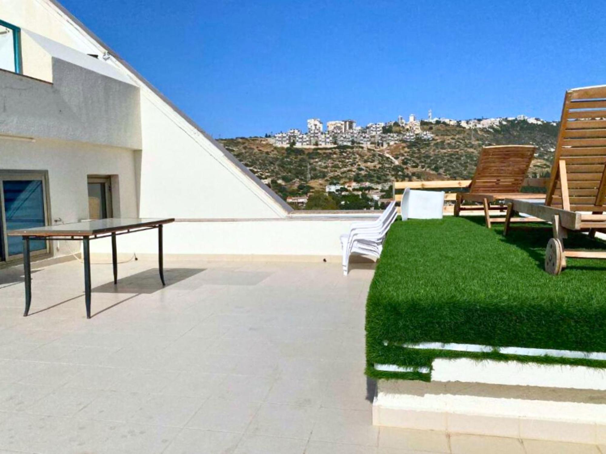 Almog Israel מגדלי חוף הכרמל